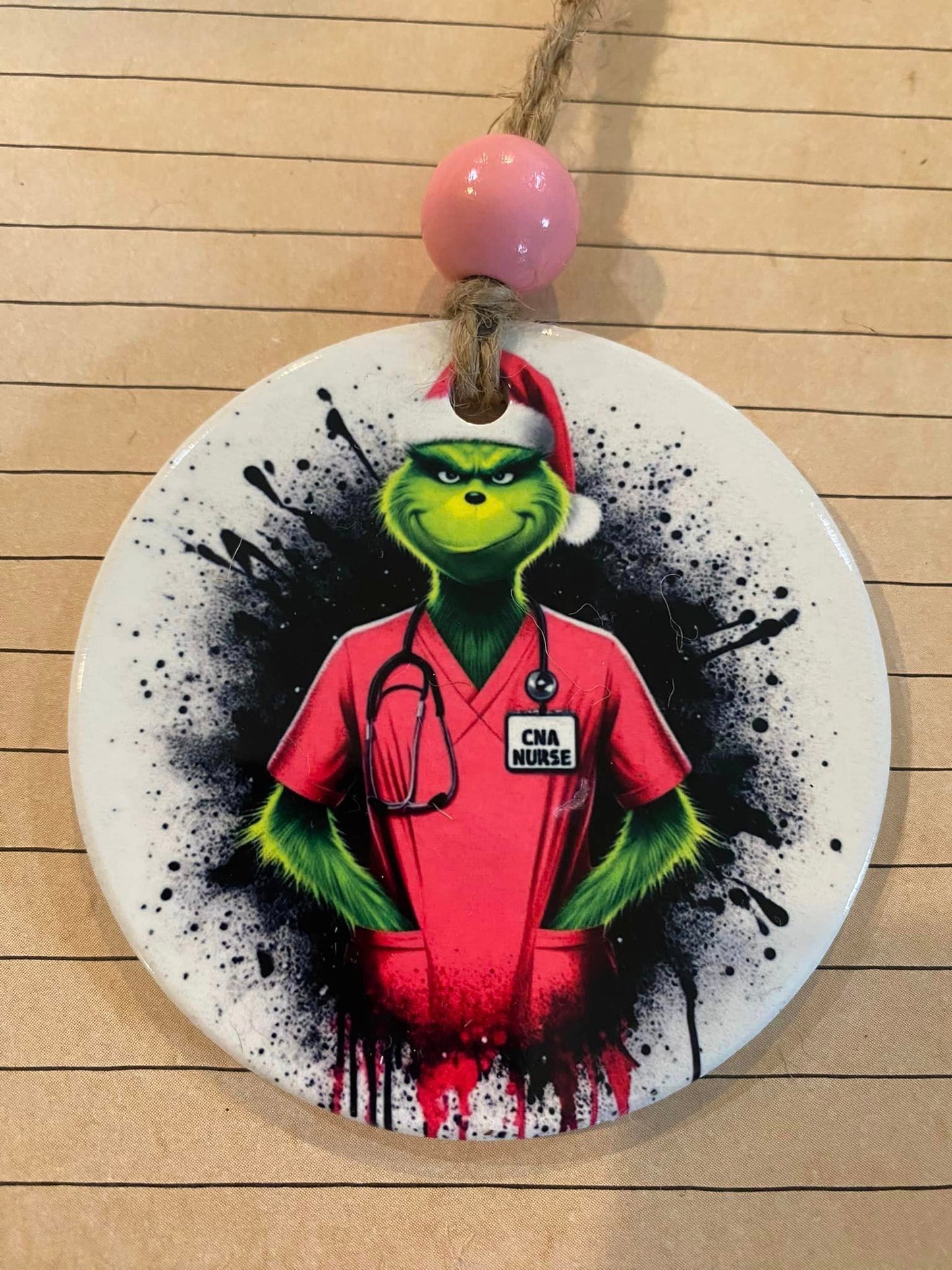 CNA Grinch in Pink Scrubs